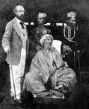 Mirza Abu Zafar Sirajuddin Muhammad Bahadur Shah Zafar (Urdu: ابو ظفر سِراجُ الْدین محمد بُہادر شاہ ظفر‎), better known as Bahadur Shah Zafar (Urdu: بہادر شاہ دوم‎), on 24 October 1775 – died 7 November 1862), was the last Mughal emperor and a member of the Timurid Dynasty.<br/><br/>

Zafar was the son of Mirza Akbar Shah II and Lalbai, who was a Hindu Rajput, and became Mughal Emperor when his father died on 28 September 1837. He used Zafar, a part of his name, meaning 'victory', for his nom de plume as an Urdu poet, and he wrote many Urdu ghazals under it.<br/><br/>

After his involvement in the Indian Rebellion of 1857, the British tried and then exiled him from Delhi and sent him to Rangoon (now Yangon) in British-controlled Burma (Myanmar).